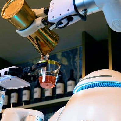 adam the robot makes a cocktail