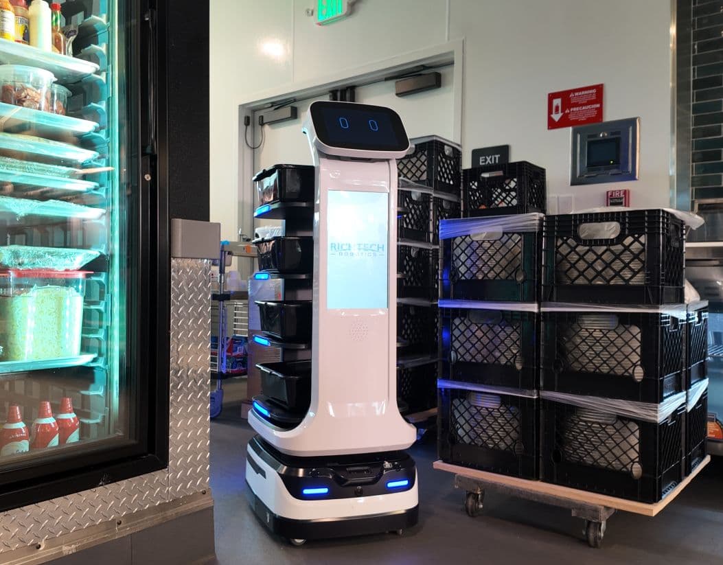 matradee in kitchen near dishes